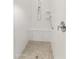Elegant walk-in shower with white subway tile, a built-in bench, and sleek chrome fixtures at 24270 N 173Rd Ave, Surprise, AZ 85387