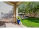 This backyard offers a patch of grass and a patio to sit and relax at 2469 S Sailors Ct, Gilbert, AZ 85295