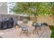 This backyard offers a grill and seating for entertaining at 2469 S Sailors Ct, Gilbert, AZ 85295