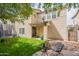 This backyard offers a trampoline, a patio, and a patch of grass at 2469 S Sailors Ct, Gilbert, AZ 85295