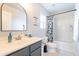 This bathroom offers a shower/tub combo and modern fixtures at 2469 S Sailors Ct, Gilbert, AZ 85295