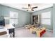 This bedroom offers many options for activities and two large windows at 2469 S Sailors Ct, Gilbert, AZ 85295