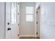 Bright entryway features a decorative glass front door, and light wood floors at 2469 S Sailors Ct, Gilbert, AZ 85295