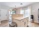 Kitchen bar area, view towards patio with glass slider at 2469 S Sailors Ct, Gilbert, AZ 85295