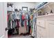 Walk-in closet with clothing racks, shelving, drawers and ample storage space at 2469 S Sailors Ct, Gilbert, AZ 85295