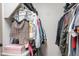 Walk-in closet with ample space for clothes and accessories at 2469 S Sailors Ct, Gilbert, AZ 85295