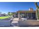 Backyard patio with panoramic views and lush landscaping, perfect for enjoying the outdoors at 25273 S Berry Brook Dr, Sun Lakes, AZ 85248