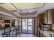 Open-concept kitchen with bar seating, perfect for casual dining and entertaining guests at 25273 S Berry Brook Dr, Sun Lakes, AZ 85248