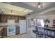 Well-lit kitchen area with modern appliances, ample counter space, and convenient bar seating at 25273 S Berry Brook Dr, Sun Lakes, AZ 85248