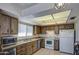 Functional kitchen with stainless steel appliances, plenty of cabinets, and counter space at 25273 S Berry Brook Dr, Sun Lakes, AZ 85248