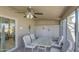 Charming enclosed patio with comfortable seating, perfect for relaxing and enjoying the view at 25273 S Berry Brook Dr, Sun Lakes, AZ 85248