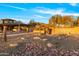 The entrance of Anthem Country Club featuring desert landscaping, cacti, and decorative rock at 2550 W Pumpkin Ridge Dr, Anthem, AZ 85086