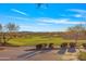 Picturesque view of the golf course at Anthem Country Club with rolling hills and mountain views at 2550 W Pumpkin Ridge Dr, Anthem, AZ 85086