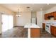Kitchen area with tile floor, oak cabinets, and appliances at 2624 E La Costa Dr, Chandler, AZ 85249
