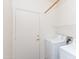 Convenient laundry room area with a washer and dryer, and exterior access at 2624 E La Costa Dr, Chandler, AZ 85249