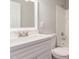 Clean, modern bathroom featuring a white vanity and shower-tub combination at 2634 N 52Nd Ave, Phoenix, AZ 85035