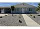 Charming single-story home featuring a classic design, well-maintained landscaping, and a welcoming entryway at 2634 N 52Nd Ave, Phoenix, AZ 85035