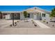Charming home featuring a covered carport and freshly landscaped front yard at 2634 N 52Nd Ave, Phoenix, AZ 85035