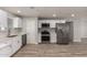 Updated kitchen featuring stainless steel appliances and ample cabinet space at 2634 N 52Nd Ave, Phoenix, AZ 85035