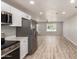 Modern kitchen seamlessly connects to the open living area at 2634 N 52Nd Ave, Phoenix, AZ 85035
