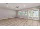 Spacious living room with sliding doors leading to an outdoor patio at 2634 N 52Nd Ave, Phoenix, AZ 85035