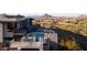 Aerial view of a luxury property with a pool and a golf course at 29218 N 107Th Way, Scottsdale, AZ 85262