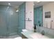 Modern bathroom with a glass shower, sleek vanity, and contemporary fixtures, providing a spa-like ambiance at 29218 N 107Th Way, Scottsdale, AZ 85262