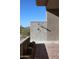 Desert landscape featuring a luxurious outdoor shower with stone accents and a sturdy brick base at 29218 N 107Th Way, Scottsdale, AZ 85262