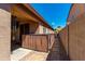 Covered patio area with a decorative privacy screen providing shade and seclusion at 29374 N 68Th Ln, Peoria, AZ 85383