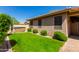 Well-maintained backyard with green lawn, privacy fence, and space for outdoor living at 29374 N 68Th Ln, Peoria, AZ 85383