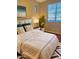 Cozy bedroom with soft natural light, a large bed, and decorative pillows at 29374 N 68Th Ln, Peoria, AZ 85383