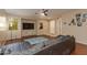 Bright living area with a cozy sofa and a view to the front entrance at 29374 N 68Th Ln, Peoria, AZ 85383