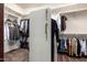 Walk-in closet providing substantial storage for clothing and accessories at 3046 E Athena Ave, Gilbert, AZ 85297