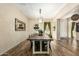 Dining room features wood floors and a fireplace at 3046 E Athena Ave, Gilbert, AZ 85297