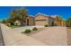 Beautiful single-Gathering house with a brick driveway and a well-manicured lawn at 3046 E Athena Ave, Gilbert, AZ 85297