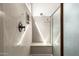 Modern shower featuring sleek tile work and a frameless glass door at 3046 E Athena Ave, Gilbert, AZ 85297