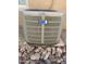 Image of an American Standard AC unit with rock enclosure at 31013 N Claridge Cir, San Tan Valley, AZ 85143