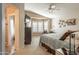 Spacious main bedroom featuring natural light, neutral walls, and an adjoining bathroom for added privacy and convenience at 31013 N Claridge Cir, San Tan Valley, AZ 85143