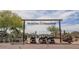 An entrance to The Golf Club at Johnson Ranch shows multiple golf carts and desert scenery at 31013 N Claridge Cir, San Tan Valley, AZ 85143