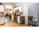 This kitchen features stainless appliances, granite counters, and an open design leading into the living room at 31013 N Claridge Cir, San Tan Valley, AZ 85143
