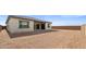 Spacious backyard of home, awaiting landscaping and personalized touches at 37650 W Nina St, Maricopa, AZ 85138