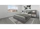Stylish bedroom featuring a gray bed with a tufted headboard, neutral bedding, and a large window at 37650 W Nina St, Maricopa, AZ 85138