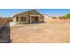 Large backyard with a covered patio, providing plenty of space for recreation and entertaining at 3805 S 73Rd Dr, Phoenix, AZ 85043