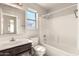 Bathroom featuring a bathtub/shower combo, vanity with sink, and medicine cabinet at 3805 S 73Rd Dr, Phoenix, AZ 85043