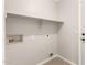 Laundry room with convenient shelf, and hookups for washer and dryer at 3805 S 73Rd Dr, Phoenix, AZ 85043