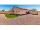Backyard featuring low maintenance desert landscaping at 41444 W Capistrano Dr, Maricopa, AZ 85138