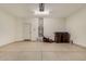 Spacious garage with ample storage and room for vehicles at 41444 W Capistrano Dr, Maricopa, AZ 85138