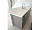Spacious kitchen island features gray cabinets and white countertops at 43372 N Wollemi St, Queen Creek, AZ 85140