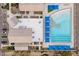 Aerial view of the community pool area with lounge chairs and multiple awnings at 4557 W South Butte Rd, San Tan Valley, AZ 85144