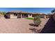 Backyard featuring desert landscaping, a patio, and a storage shed at 4557 W South Butte Rd, San Tan Valley, AZ 85144